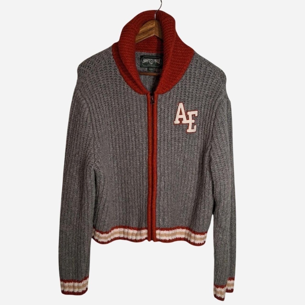 Womens American Eagle Outfitters gray zip-up sweater with red collar and cuffs,